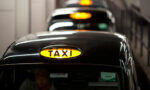 A queue of London taxis.
