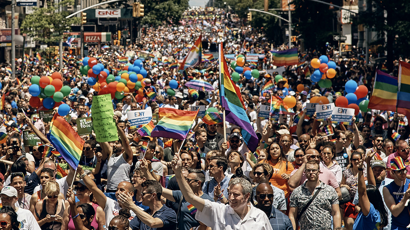 New York City Mayor Bill de Blasio, bottom center, marches during the New York City Pride Parade on Sunday, June 25, 2017, in New York. (AP Photo/Andres Kudacki)